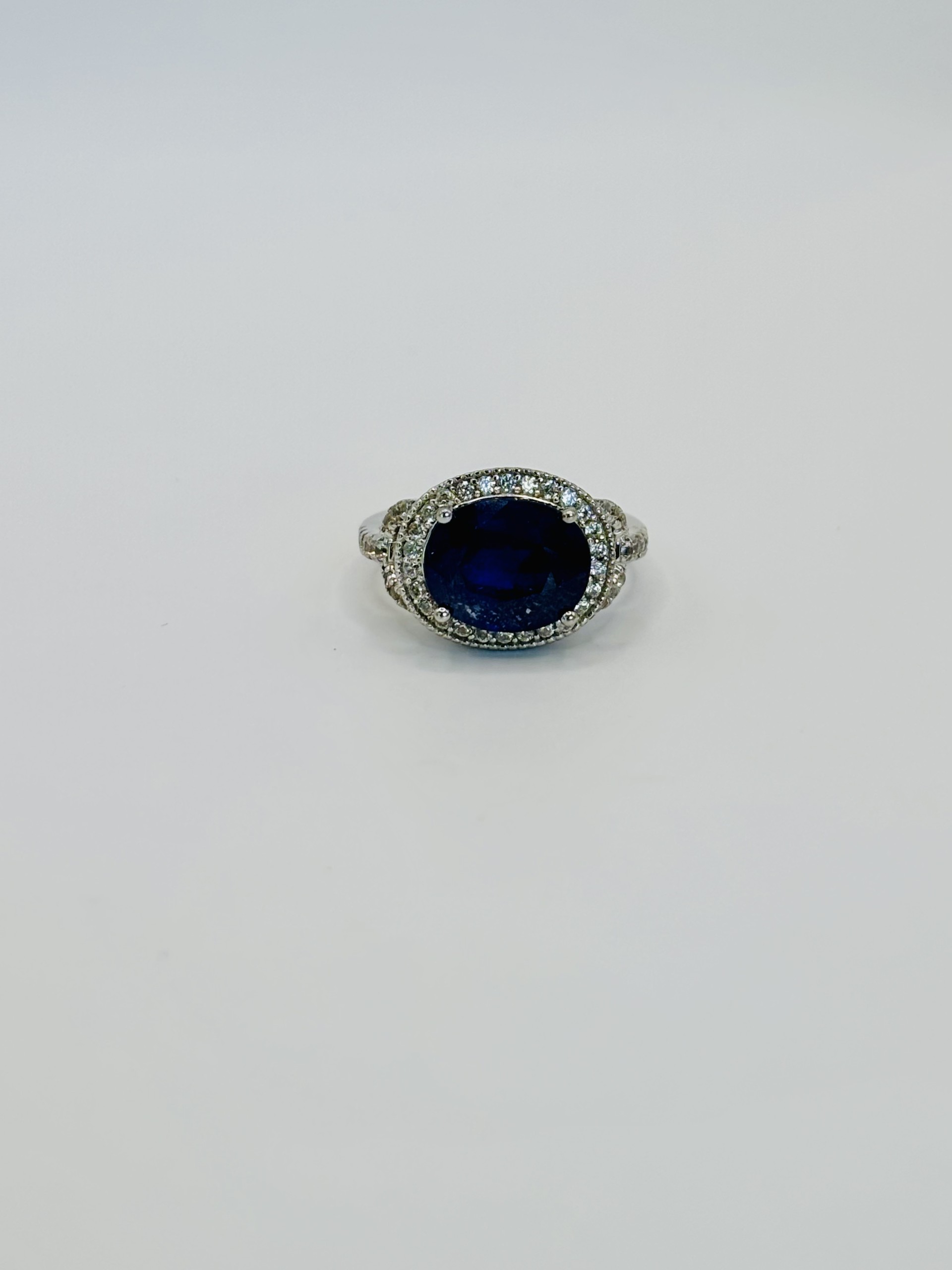 Sideways Sapphire Halo Ring