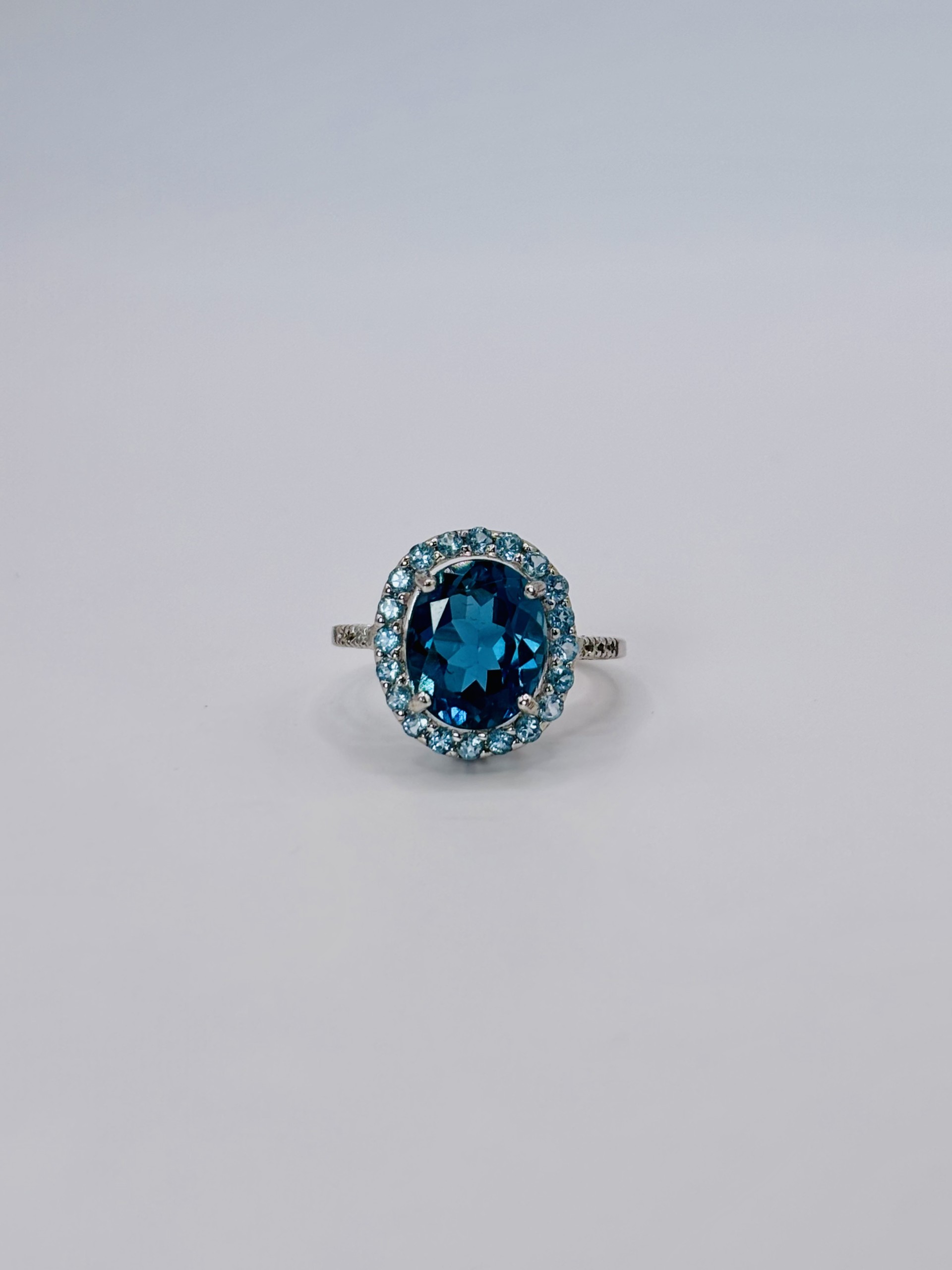 Blue Topaz Halo Ring